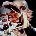 Sinéad O'Connor rips up a photograph of the Pope.