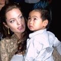 Angelina Jolie adopts Maddox.