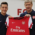 Özil signs for Arsenal.