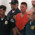 Timothy McVeigh is charged for the Oklahoma City bombing.